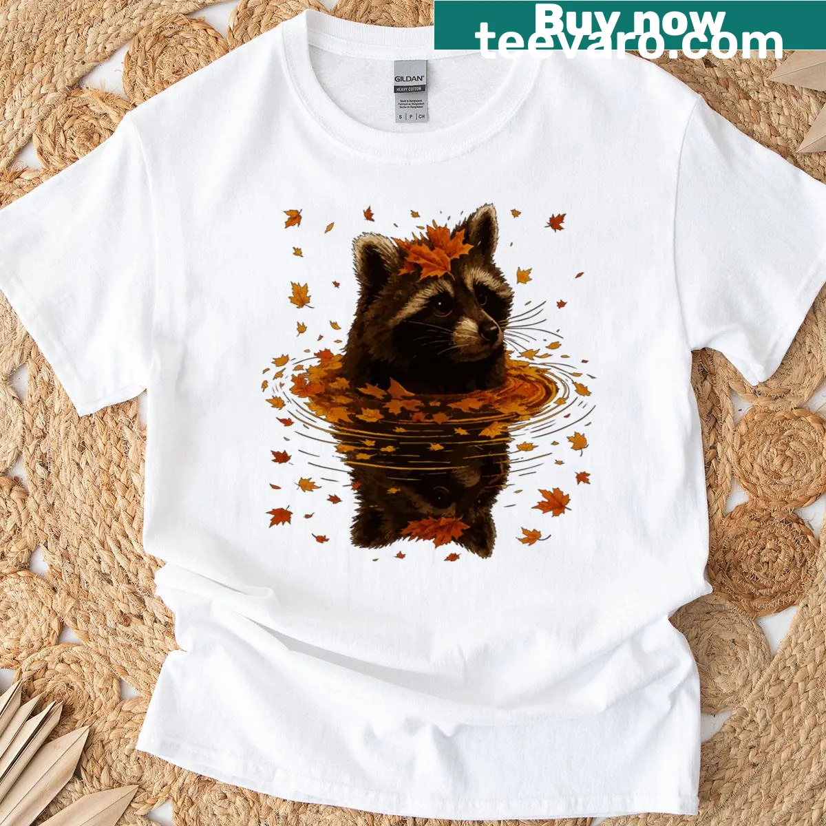 Autumn raccoon art with fall leaves graphic t-shirt — on a men's t-shirt