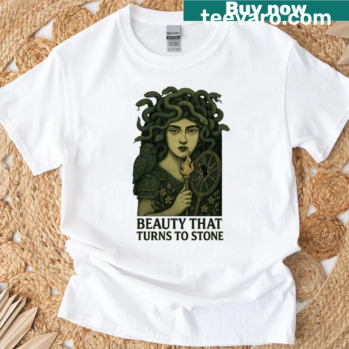 Minimalist typography t-shirt with the phrase 'Beauty That Turns To Stone' — on a men's t-shirt