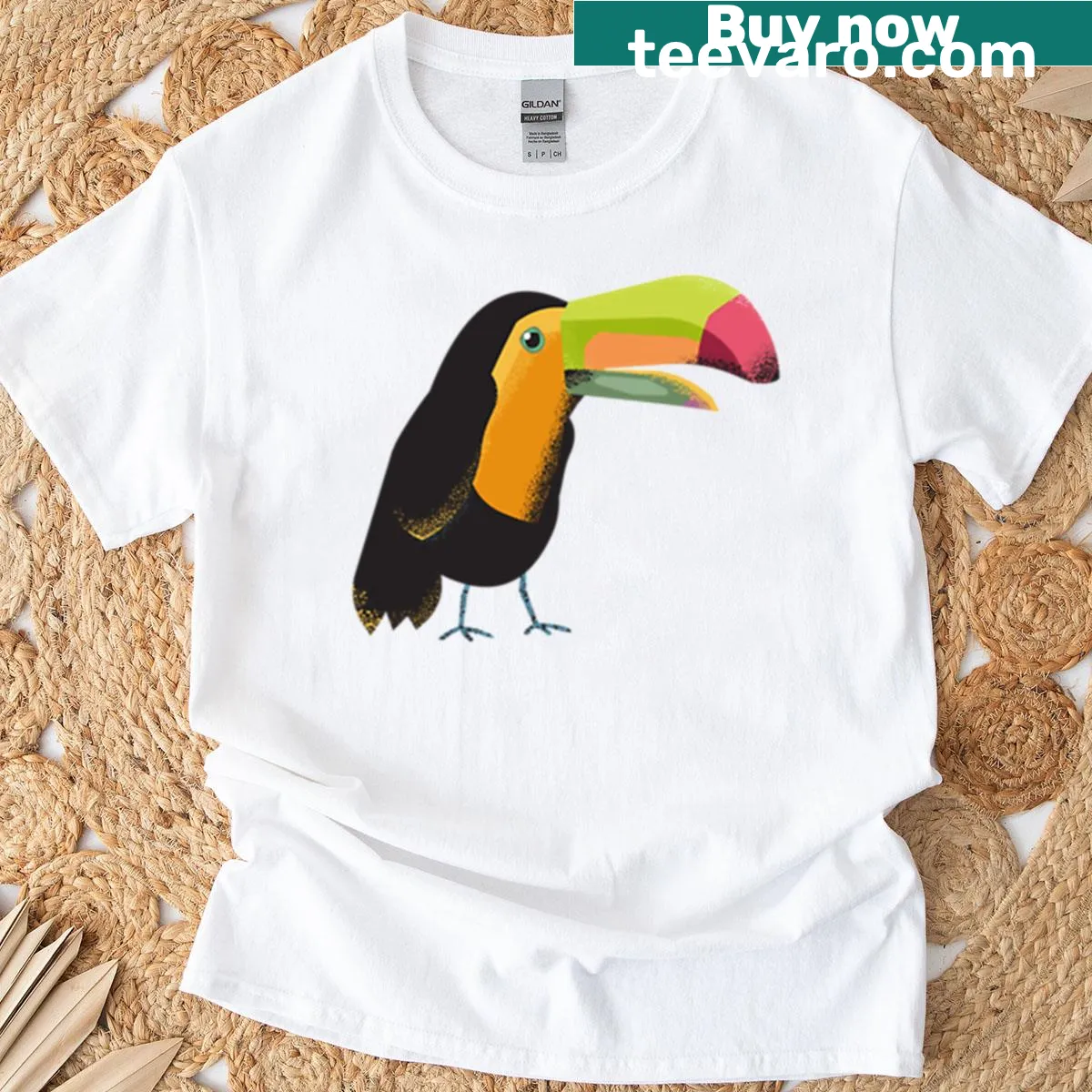 T-shirt featuring a curious toucan illustration — on a men's t-shirt