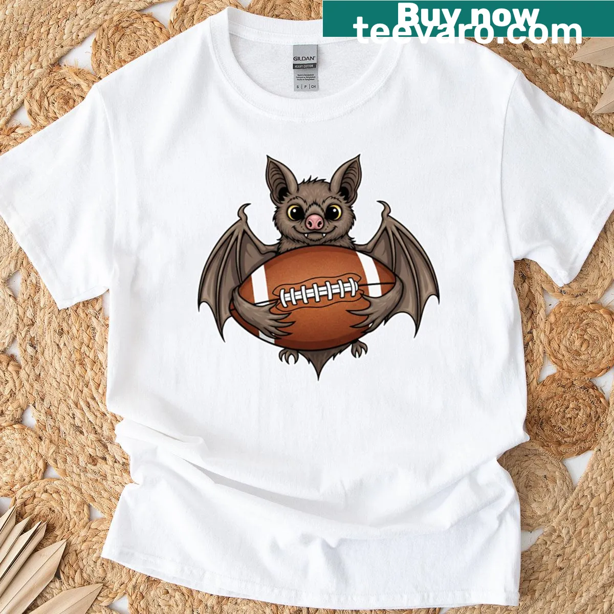 Minimalist cartoon bat playing football with a cute design — on a men's t-shirt