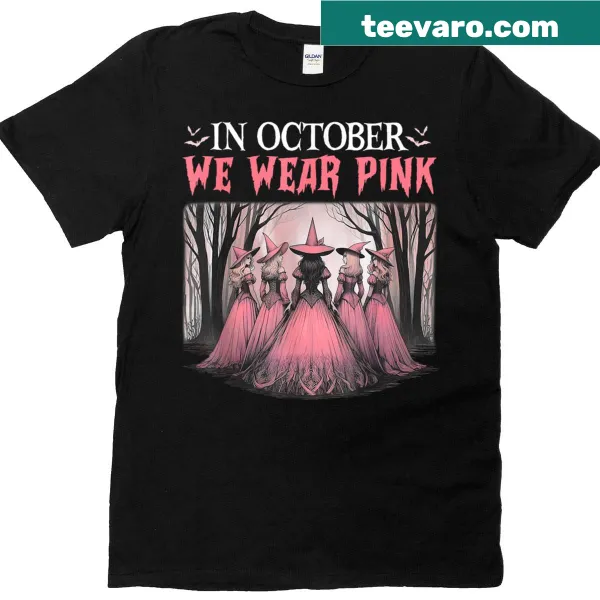 Halloween T-shirt featuring 'In October We Wear Pink' with witchy design elements.