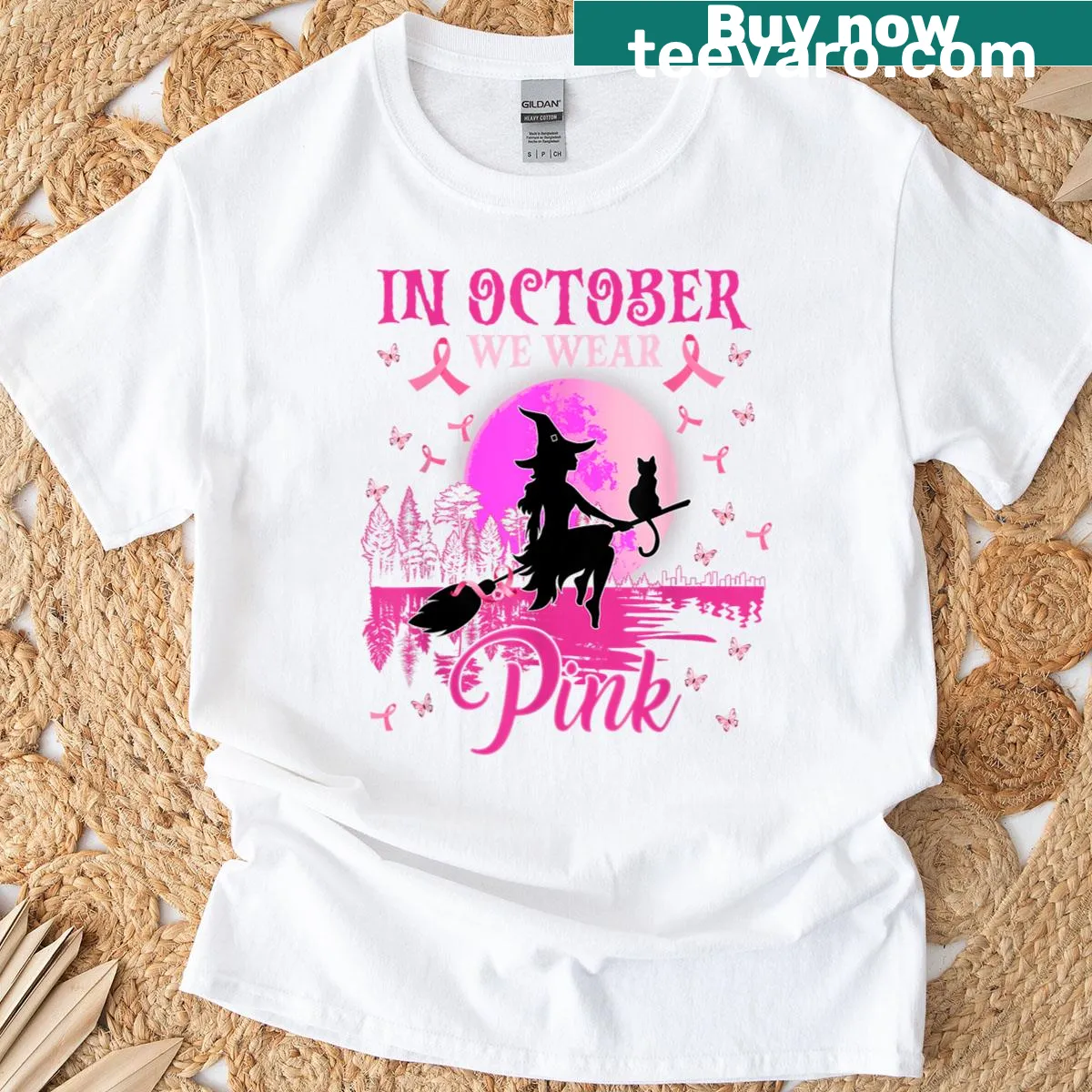 Vintage-style T-shirt with witch graphic and 'In October We Wear Pink' text — on a men's t-shirt
