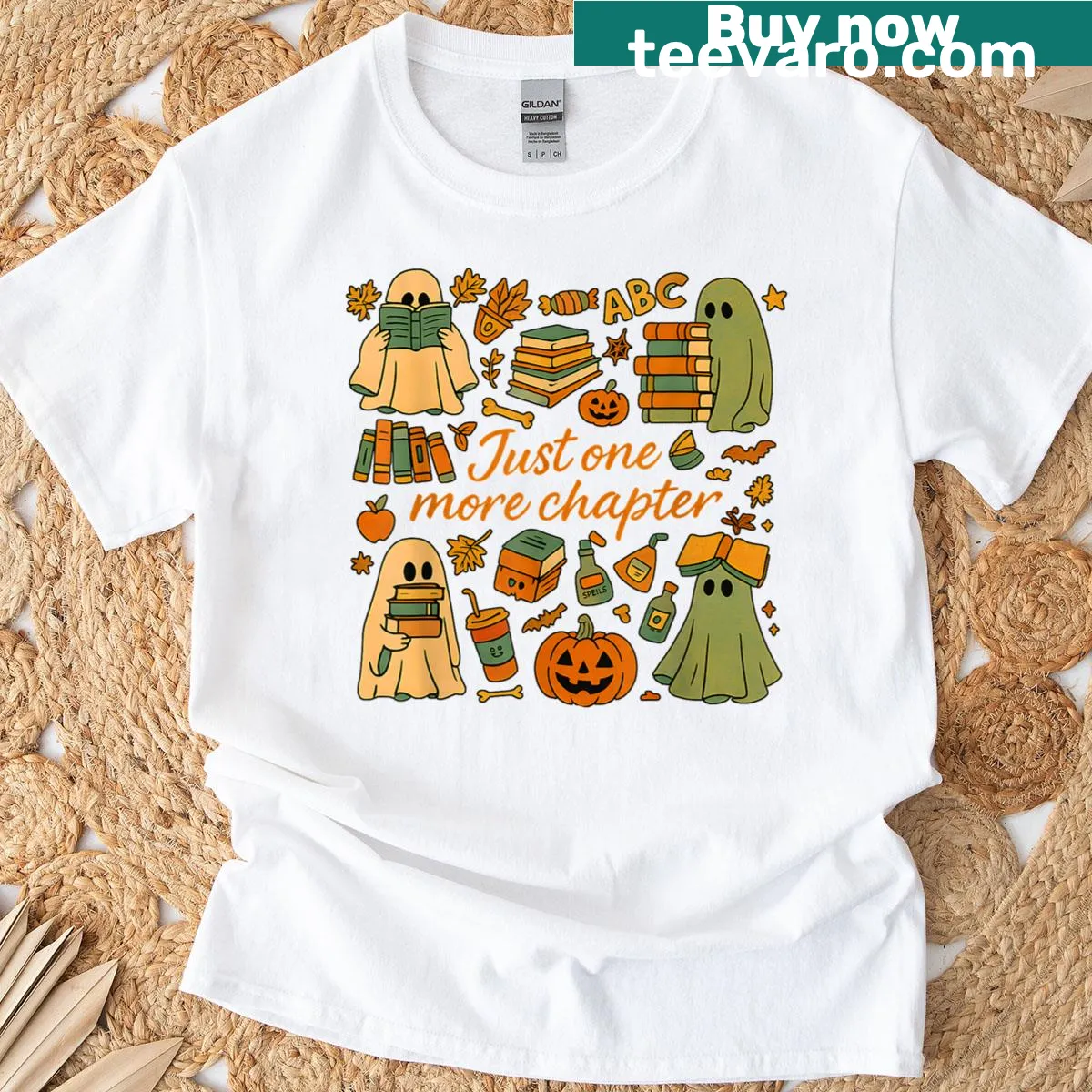 Cute Halloween T-shirt with a whimsical ghost behind books. — on a men's t-shirt