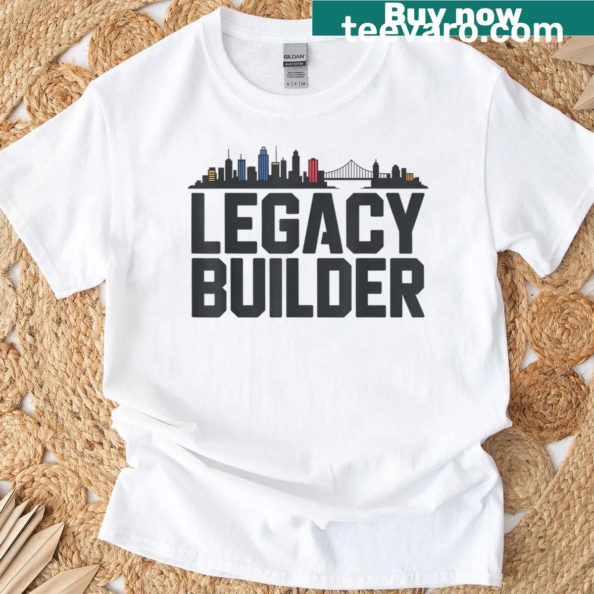 Bold typography on a shirt emphasizing entrepreneur mindset and legacy building. — on a men's t-shirt