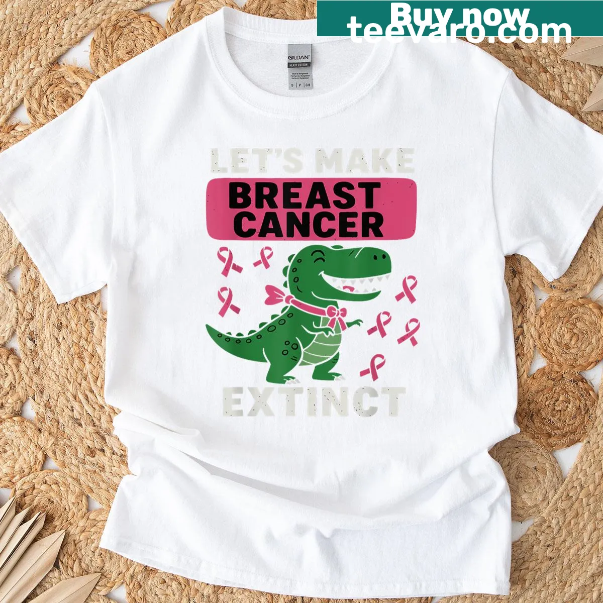 T-shirt with pink dinosaur graphic and breast cancer awareness message. — on a men's t-shirt