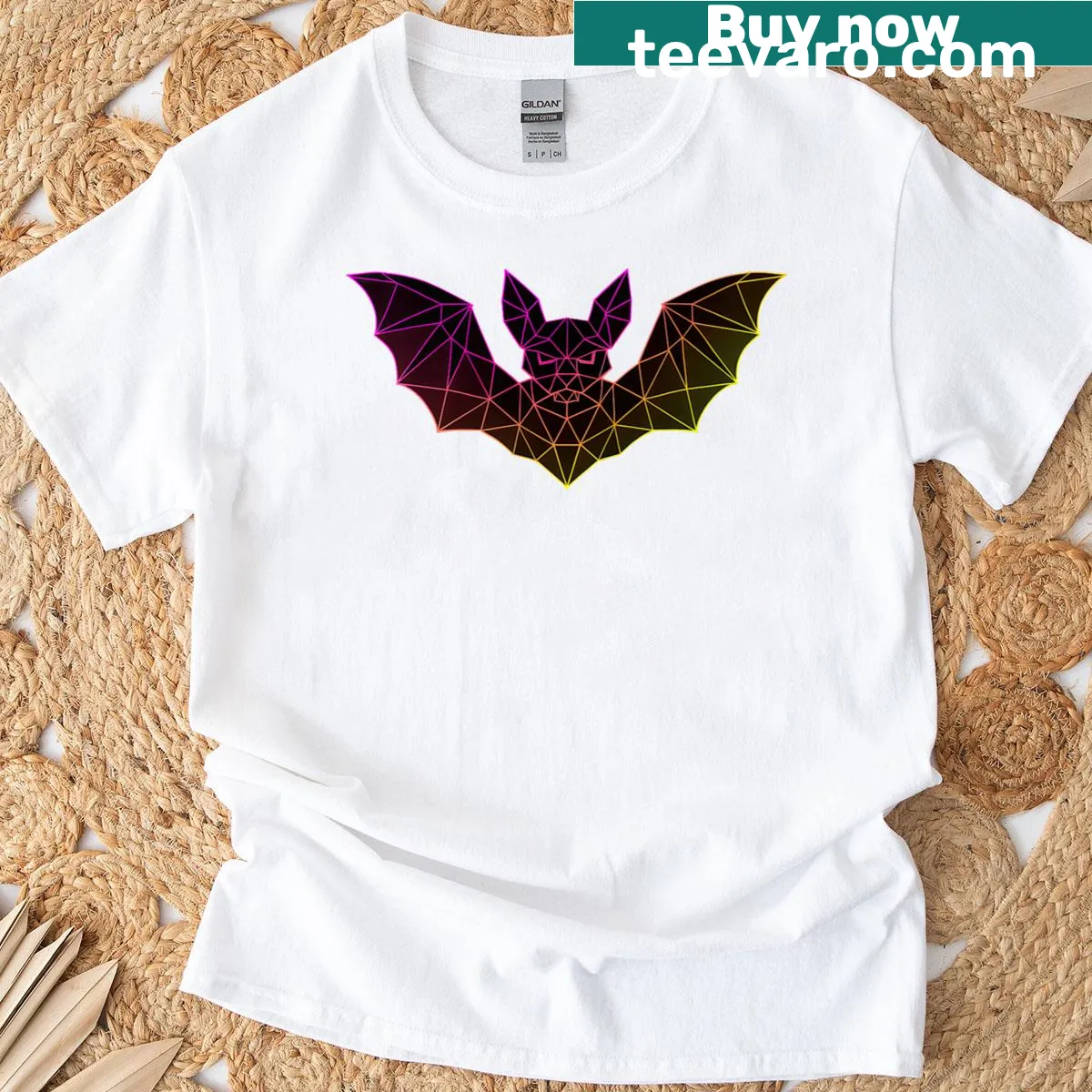 Minimalist geometric vampire bat design T-shirt — on a men's t-shirt