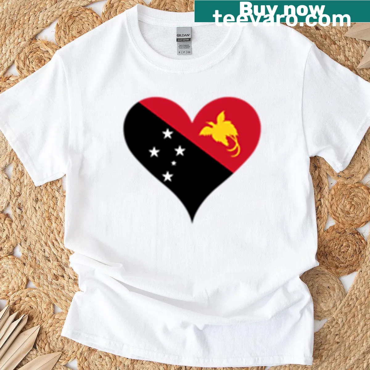 Heart-shaped Papua New Guinea flag graphic on a t-shirt. — on a men's t-shirt