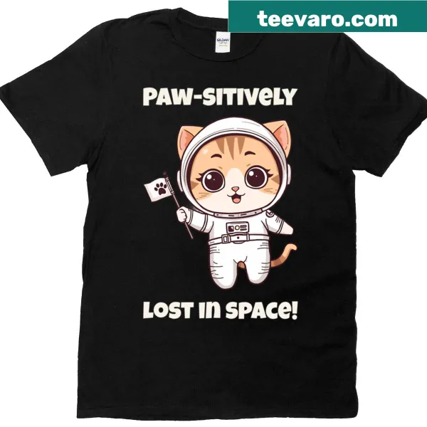 T-shirt featuring a cute cat astronaut with the pun 'Paw-sitively Lost In Space'