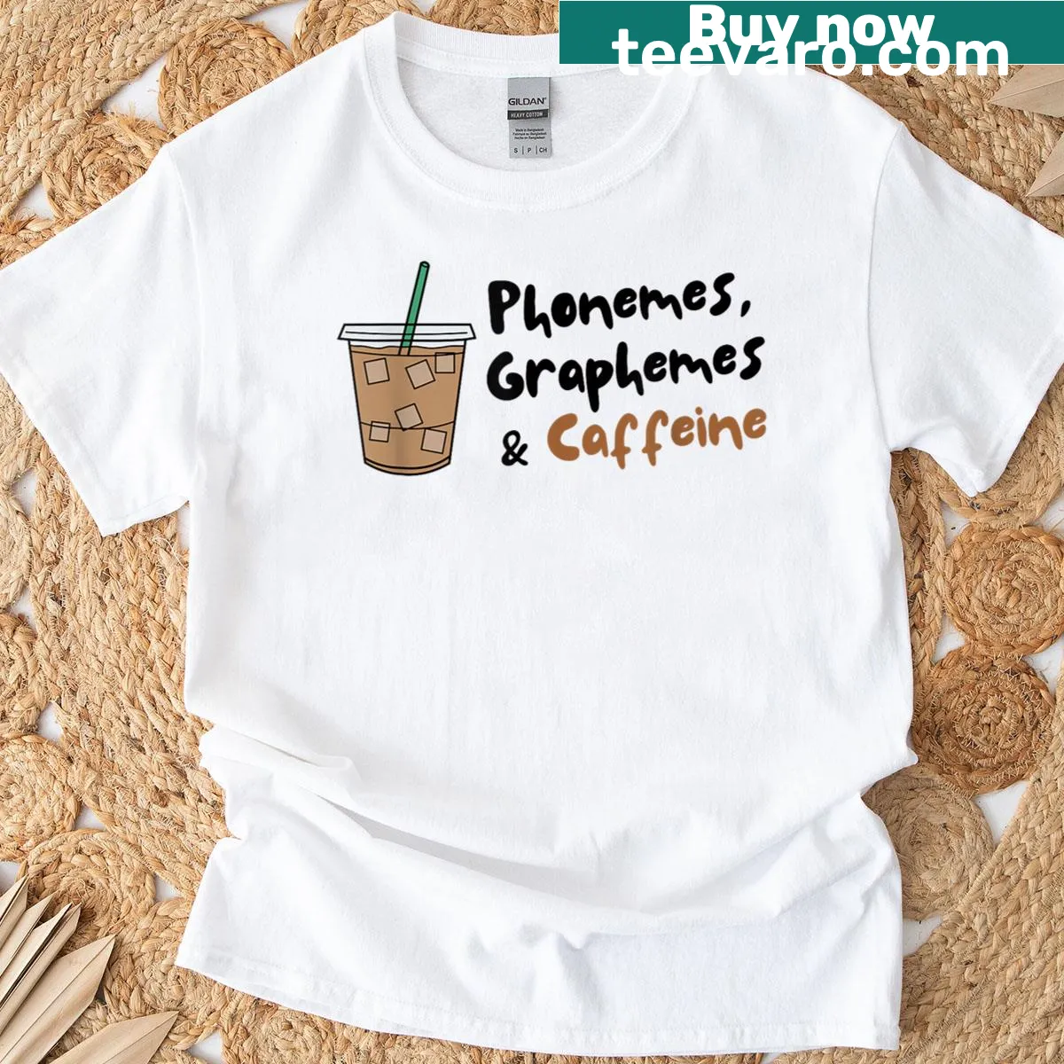 Teacher T-shirt with Phonemes, Graphemes, and caffeine text — on a men's t-shirt