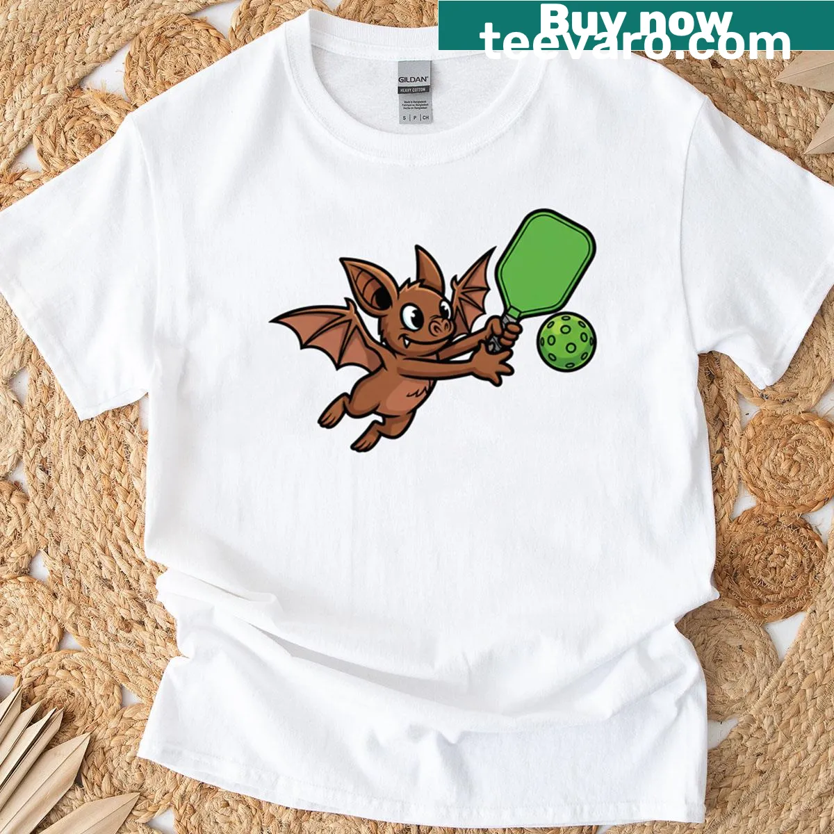 Cute Halloween T-shirt with a bat and pickleball bat illustration — on a men's t-shirt