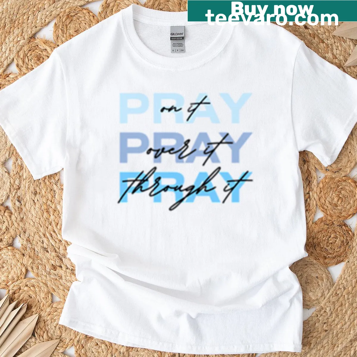 Minimal typography T-shirt with the word 'Pray' — on a men's t-shirt