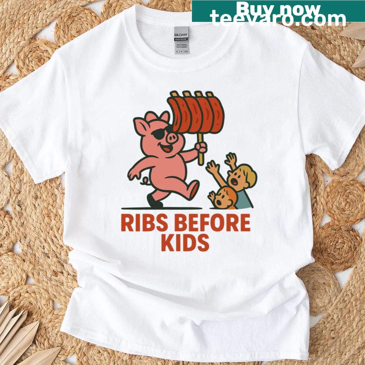 Funny BBQ-themed T-shirt saying Ribs Before Kids — on a men's t-shirt