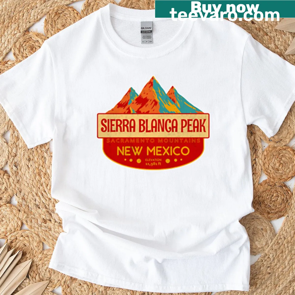 Illustrative T-shirt featuring Sierra Blanca Peak and mountain scenery. — on a men's t-shirt
