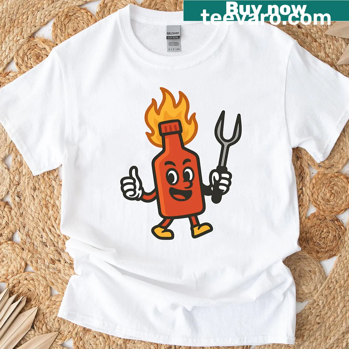 Cartoon hot sauce mascot with flames on T-shirt — on a men's t-shirt