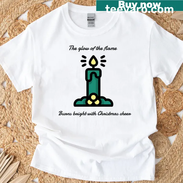 Christmas T-shirt featuring a candle design spreading cheer and warmth.