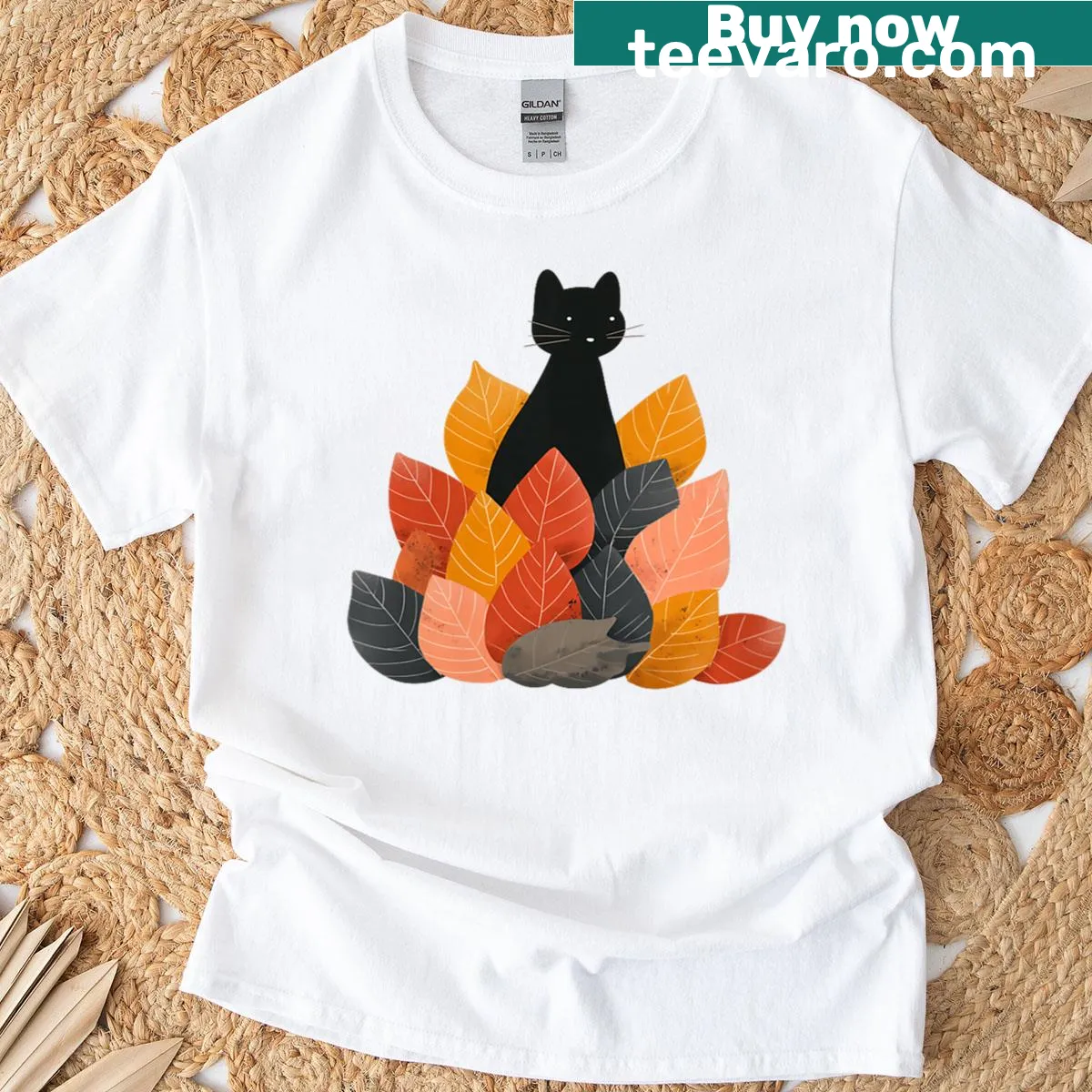 Cute T-shirt with a cat peeking through autumn leaves — on a men's t-shirt