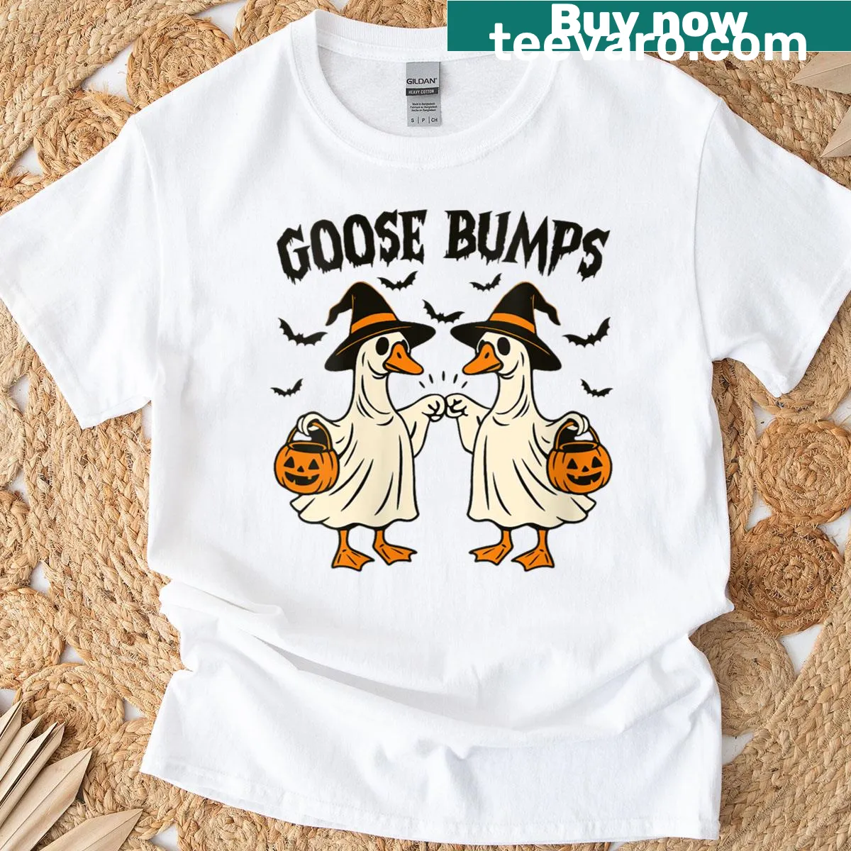 Cartoon Halloween T-shirt with a goose and spooky elements — on a men's t-shirt