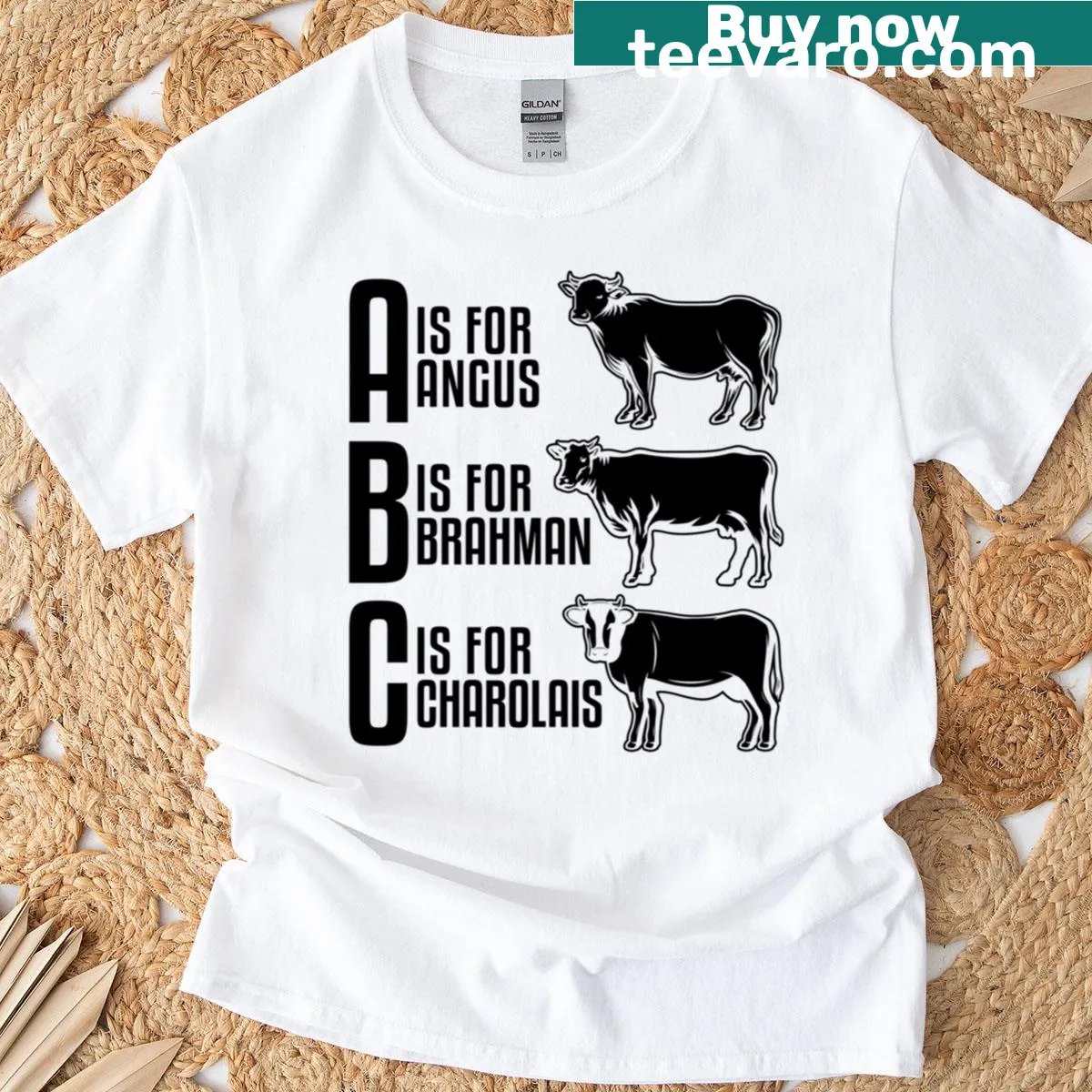Illustrated farm animal T-shirt with educational letters — on a men's t-shirt