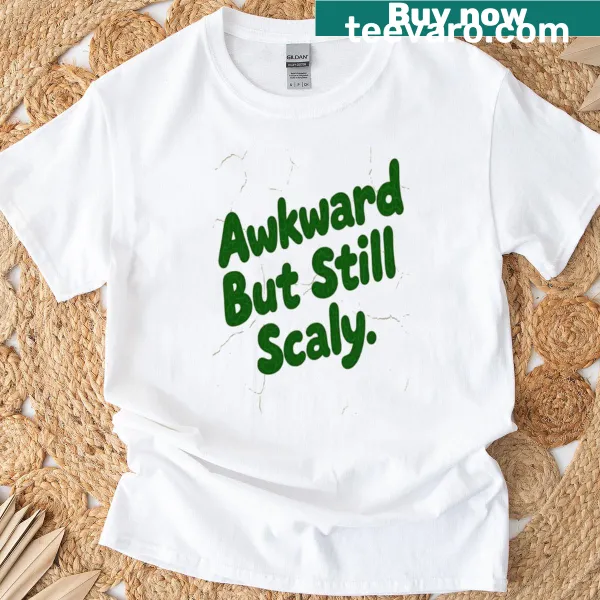 Oversized t-shirt with the phrase 'Awkward But Still Scaly' in playful typography