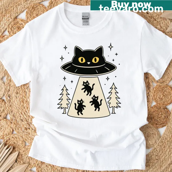 Whimsical cat ufo abduction graphic on a T-shirt