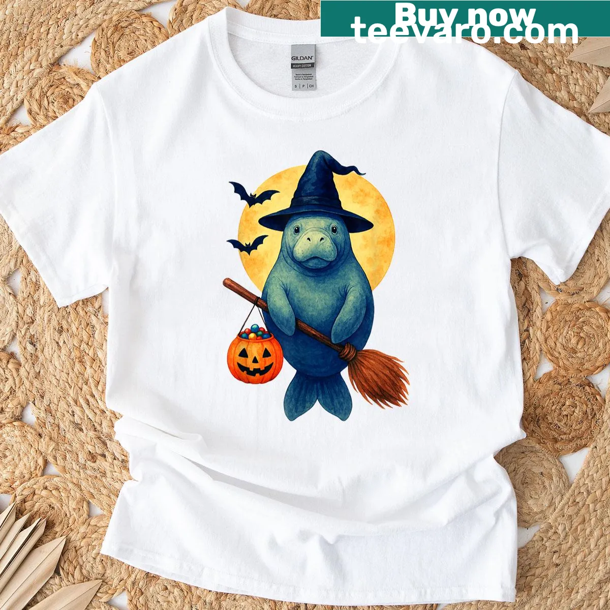 Cute manatee design wearing a witch hat and pumpkin for Halloween. — on a men's t-shirt