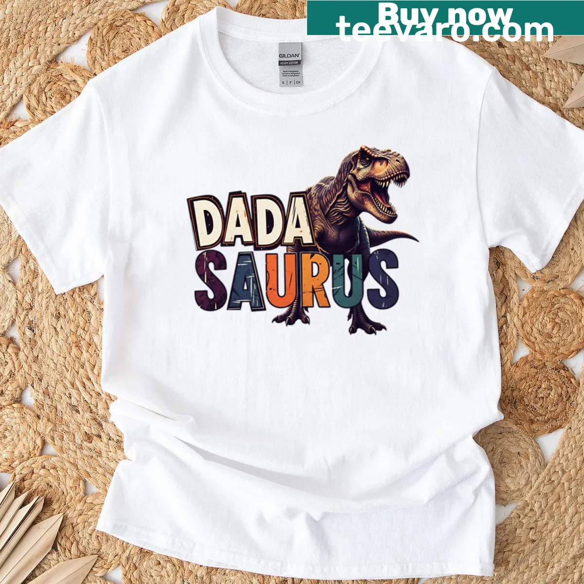 Funny T-shirt with 'Dada Saurus' T-rex design — on a men's t-shirt