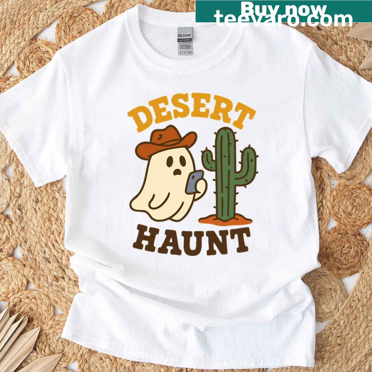 Cartoon ghost cowboy riding a cactus in a Halloween-themed t-shirt — on a men's t-shirt