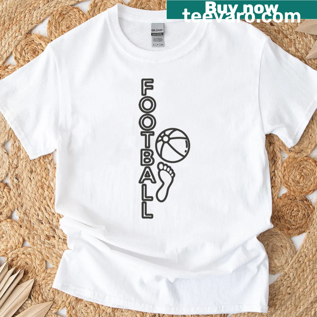 Football themed t-shirt with foot and ball graphic — on a men's t-shirt