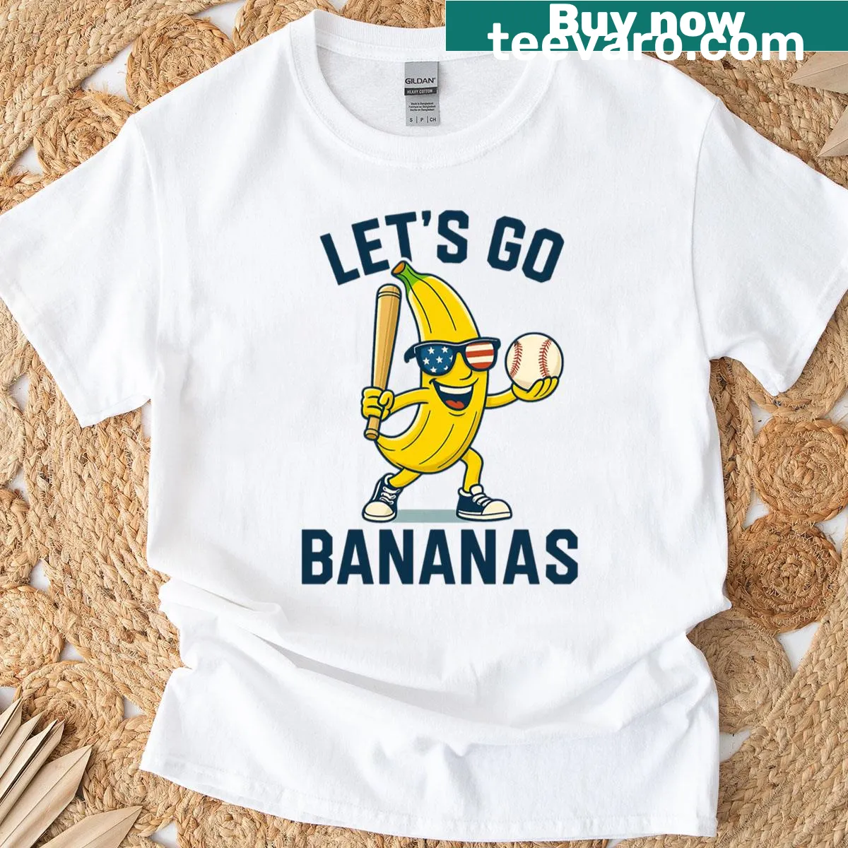 Cartoon banana playing baseball with the text 'Lets Go Bananas' on a sports fan t-shirt — on a men's t-shirt