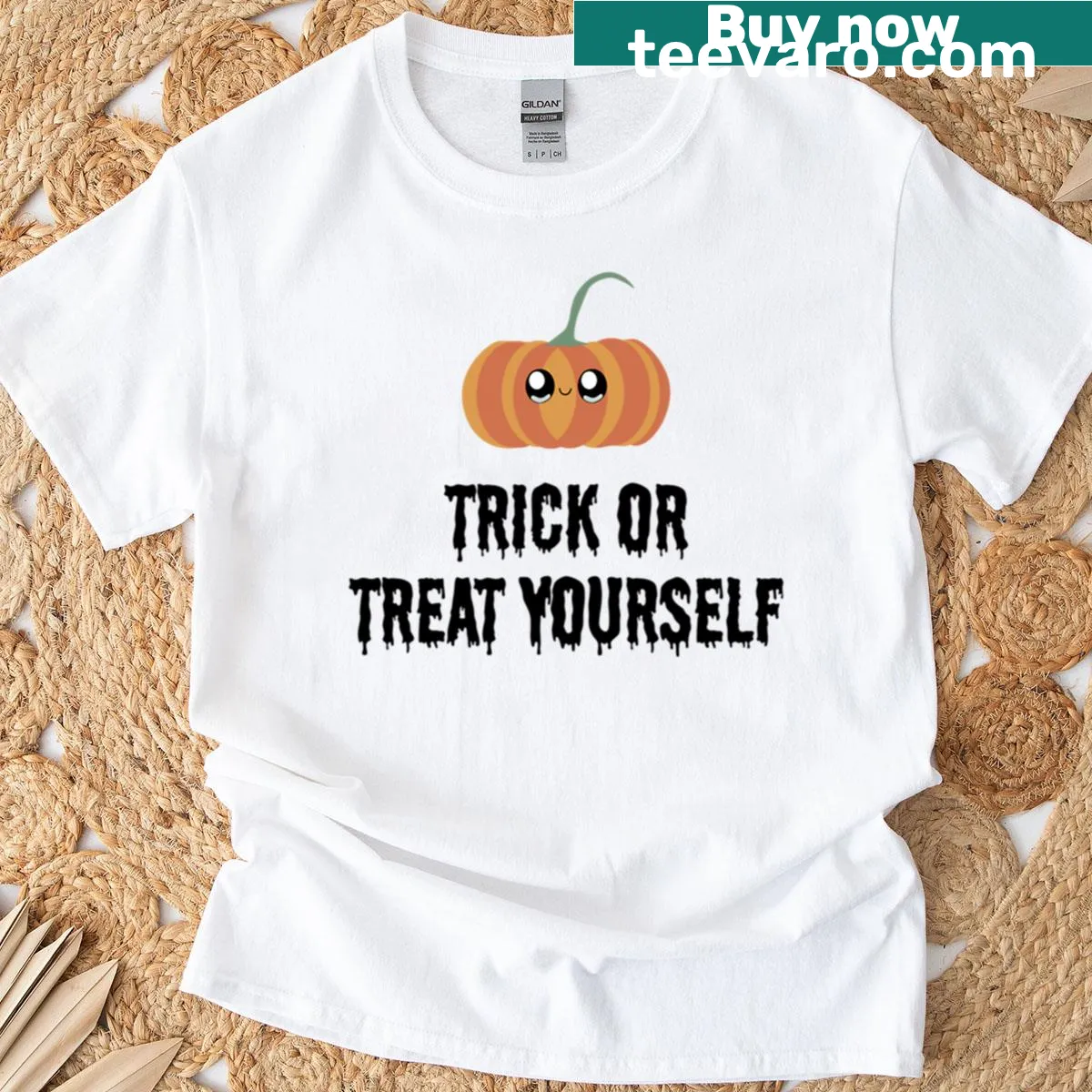 Oversized Halloween shirt featuring a happy pumpkin graphic. — on a men's t-shirt