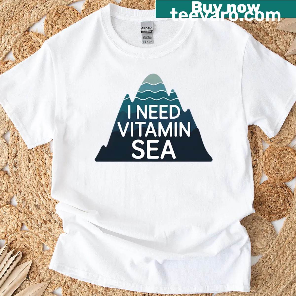Ocean wave graphic T-shirt with travel quote about needing sea — on a men's t-shirt