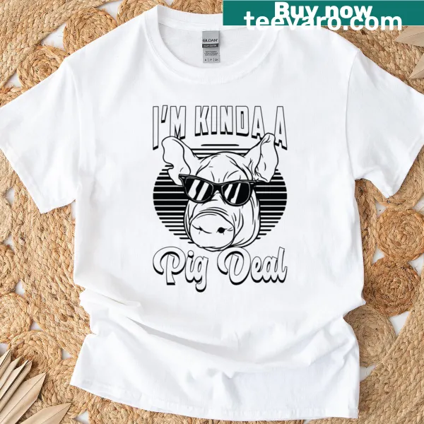 Vintage distressed graphic with 'I'm Kinda A Pig Deal' text on a t-shirt