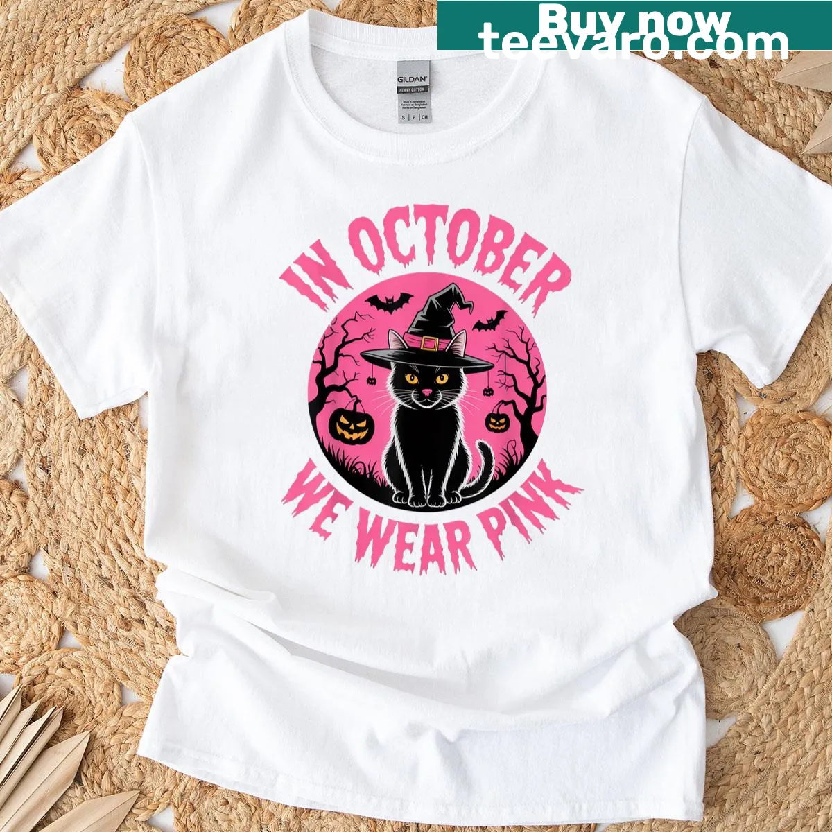 Black cat witch graphic with pink text on a t-shirt — on a men's t-shirt