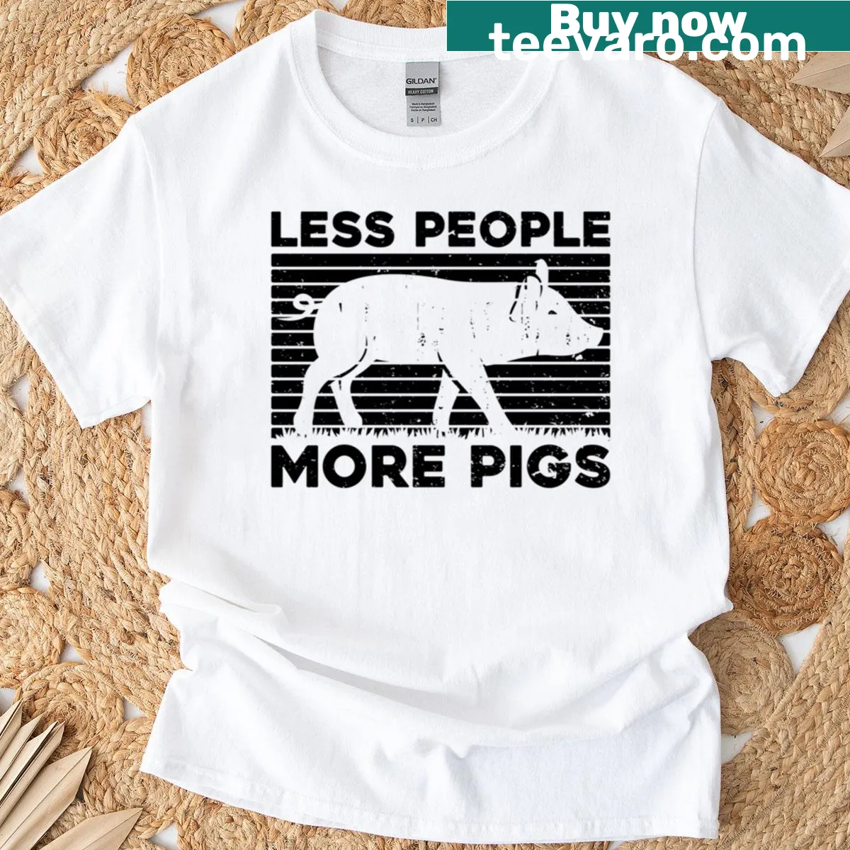 T-shirt with 'Less People More Pig' graphic and playful pig illustration — on a men's t-shirt