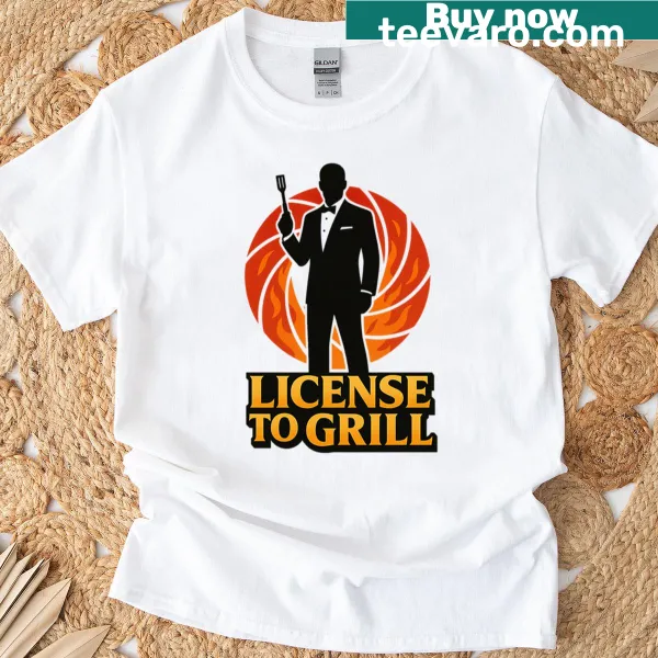Badge-style graphic saying 'License To Grill' on a T-shirt