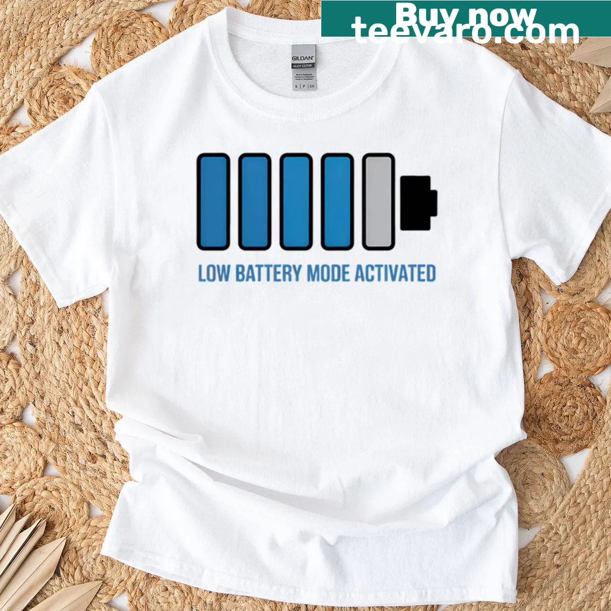 Minimalist t-shirt with 'Low Battery Mode Activated' text — on a men's t-shirt