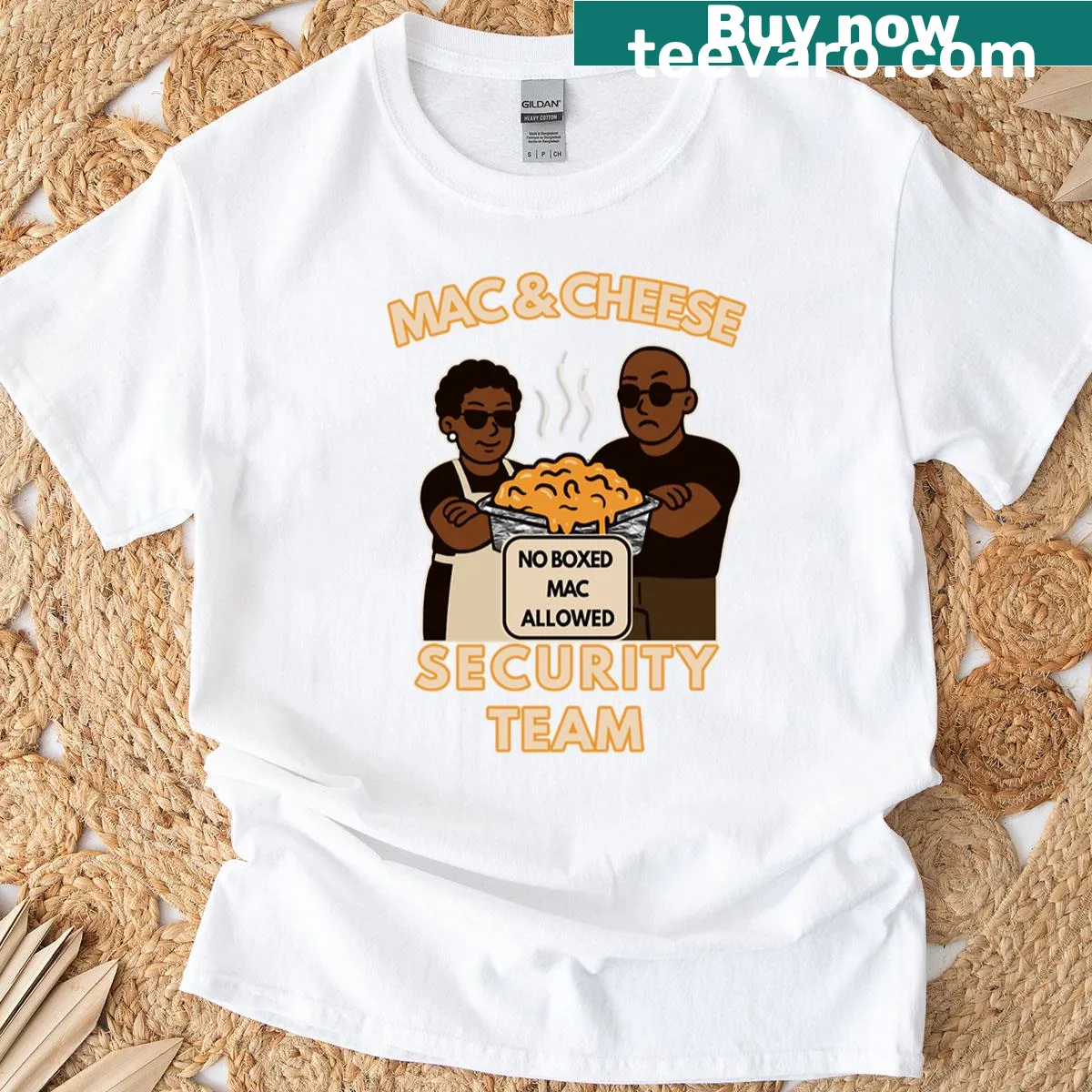 Funny oversized t-shirt with Mac Cheese Security Team graphic for Thanksgiving — on a men's t-shirt