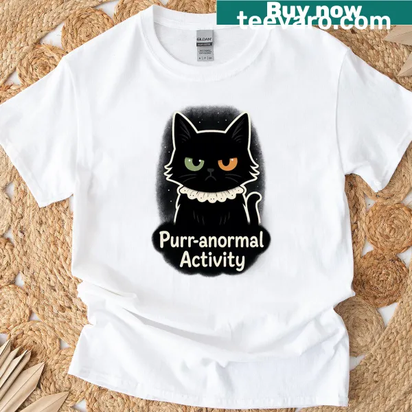 Oversized t-shirt with a playful cat and paranormal theme