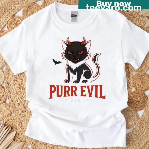 Cartoon devil cat graphic on a T-shirt reading 'Purr Evil'
