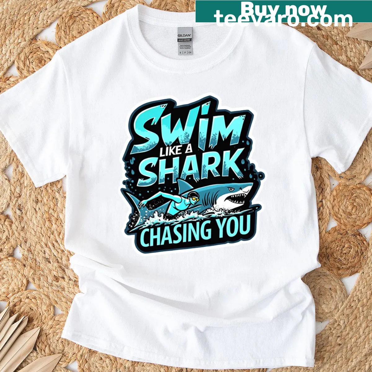 Funny graphic shirt with a shark chasing swim theme — on a men's t-shirt