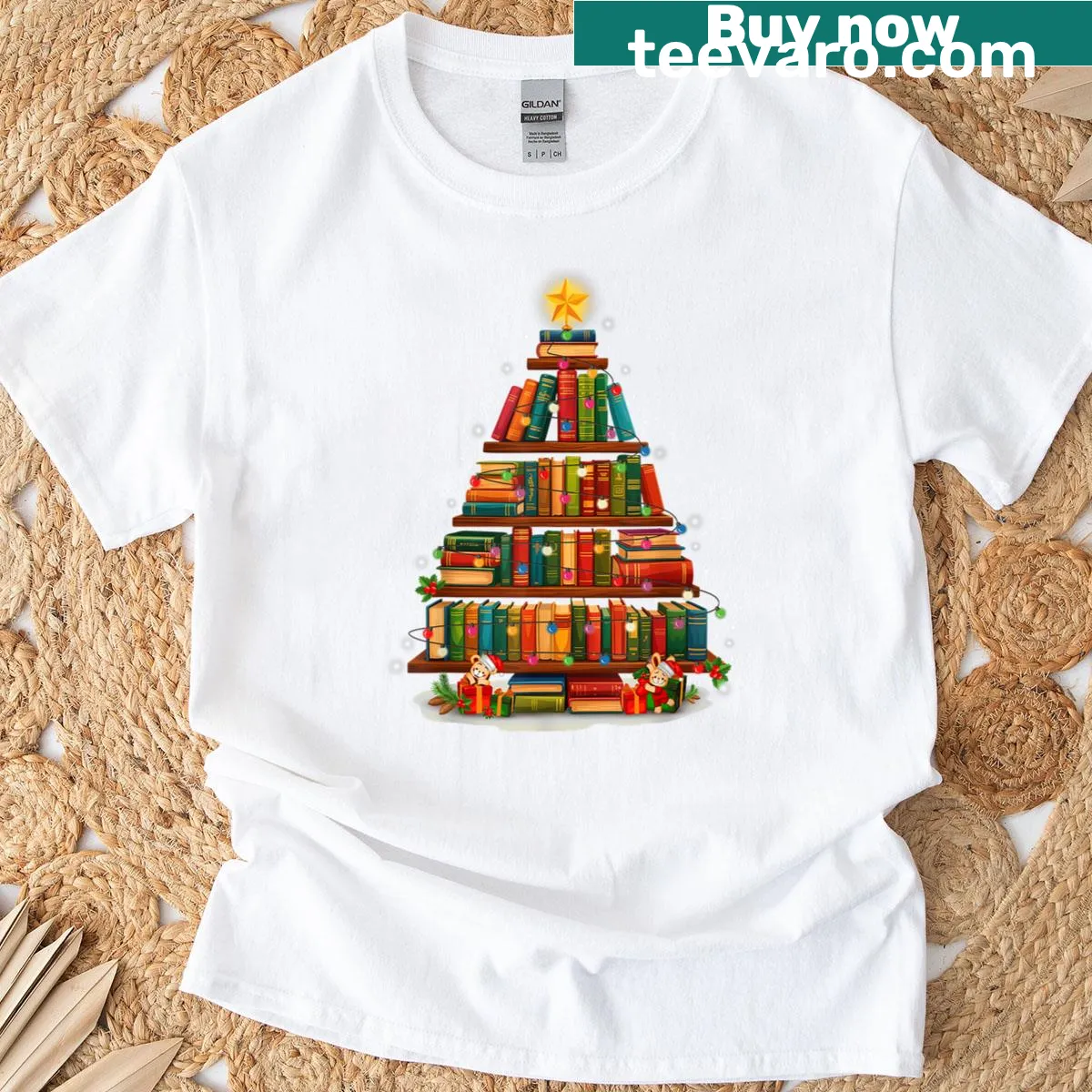 Christmas-themed teacher T-shirt with books, a tree, and lights — on a men's t-shirt