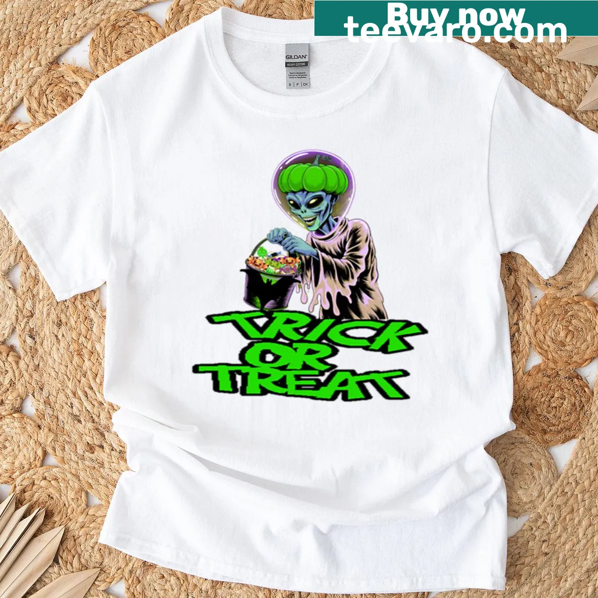 Halloween-themed T-shirt with alien illustration — on a men's t-shirt