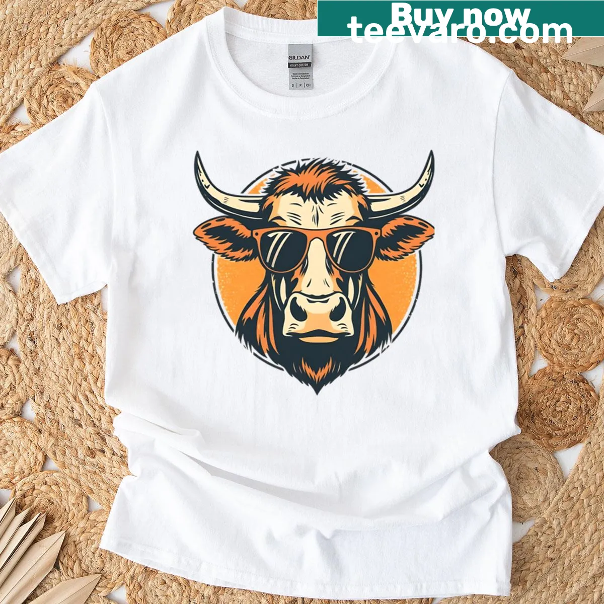 Vintage-style illustration of a cow wearing sunglasses — on a men's t-shirt