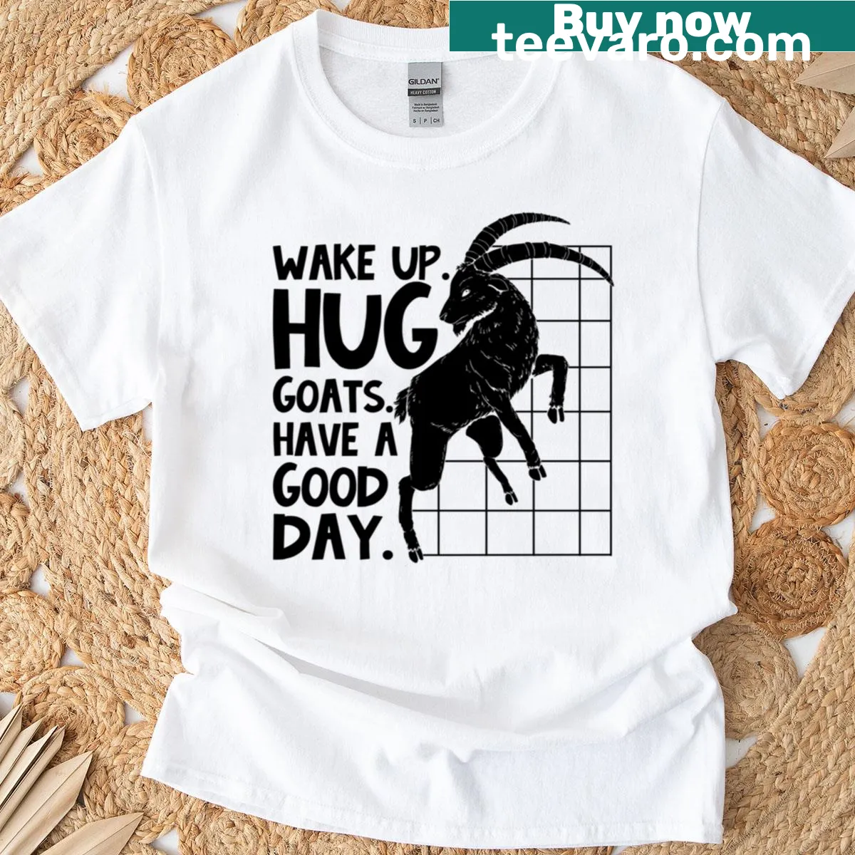 Whimsical t-shirt with goats and the phrase 'Wake Up Hug Goats'. — on a men's t-shirt