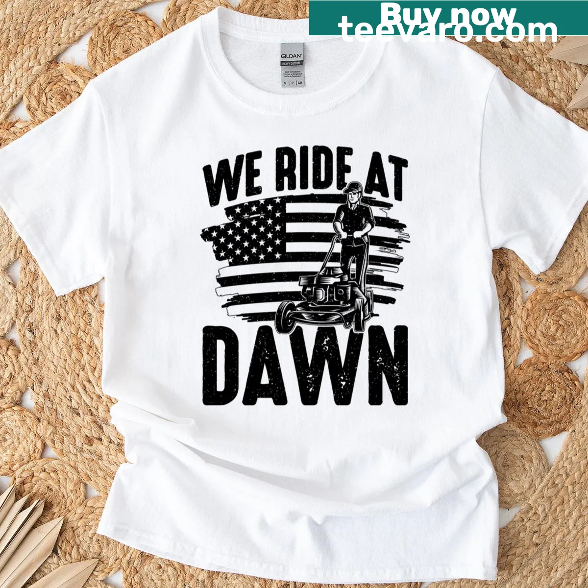 T-shirt with the phrase 'We Ride At Dawn' and a mower graphic. — on a men's t-shirt
