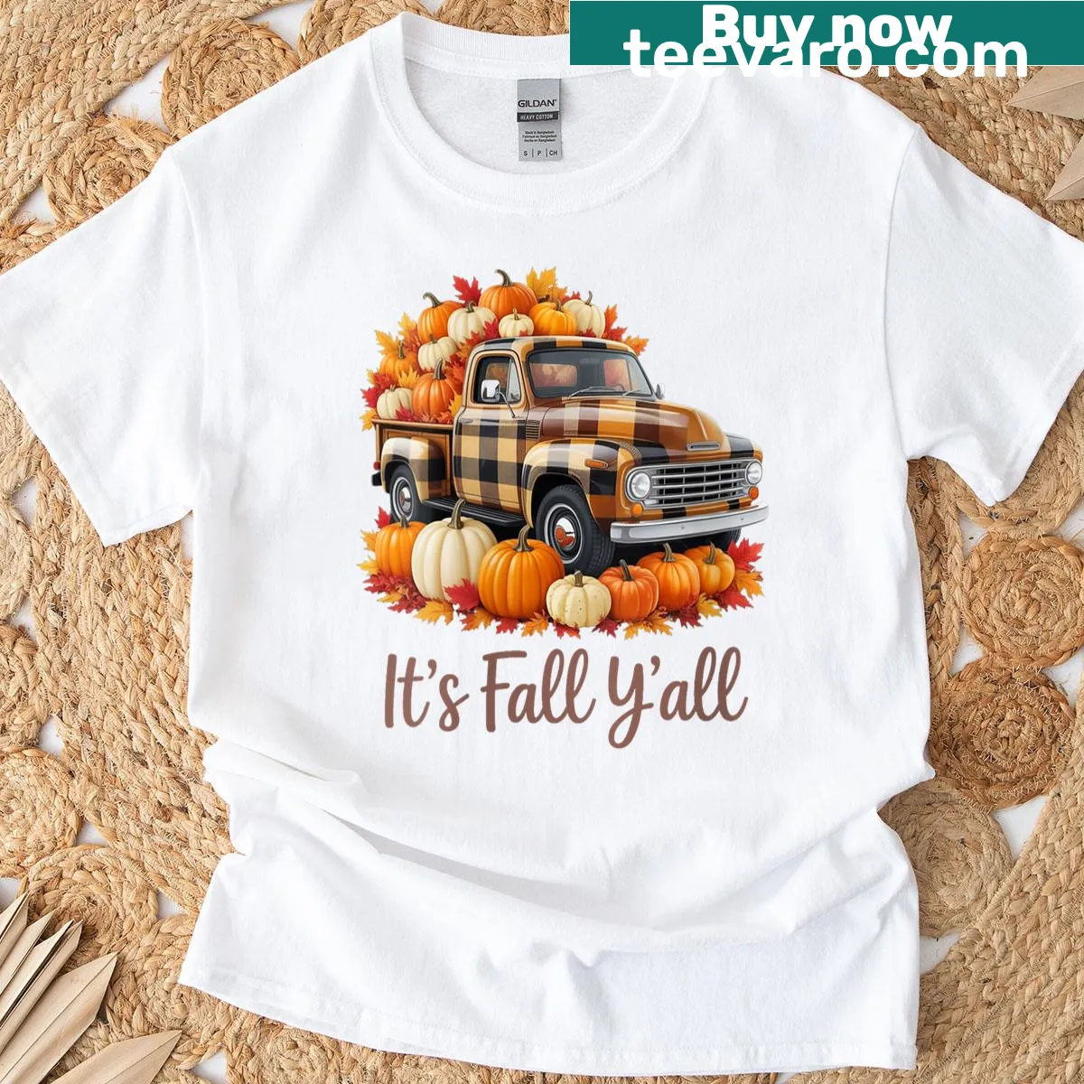 Fall-themed t-shirt with truck, pumpkins, and leaves graphic — on a men's t-shirt