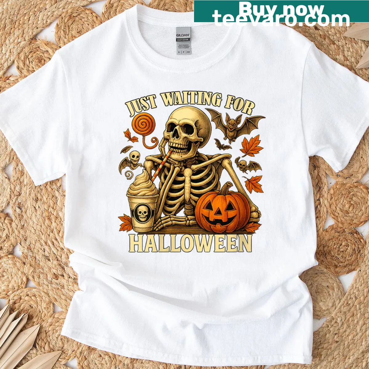 Skeleton and pumpkin graphic on a Halloween-themed women's t-shirt — on a men's t-shirt