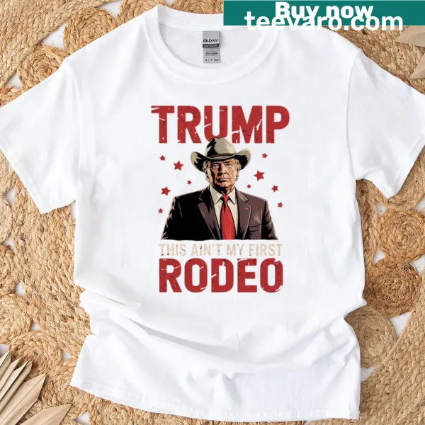 Funny cowboy-themed T-shirt with 'Ain't My First Rodeo' text