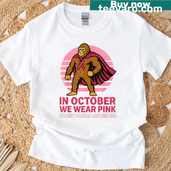 Illustrative T-shirt of a playful Bigfoot character for breast cancer awareness.