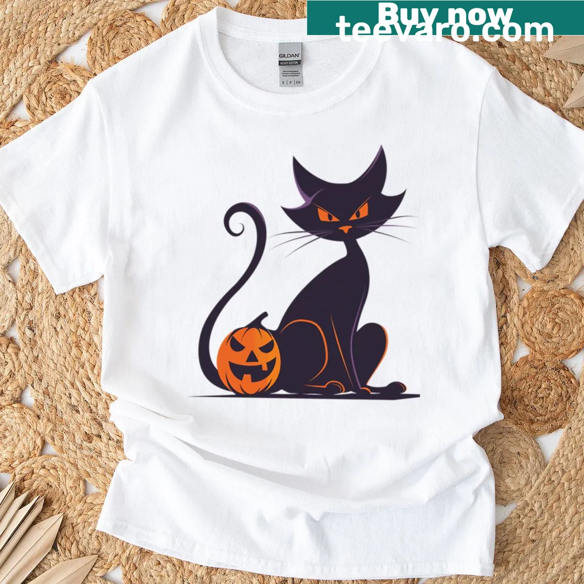 Minimalist Halloween t-shirt with black cat and pumpkin illustration — on a men's t-shirt